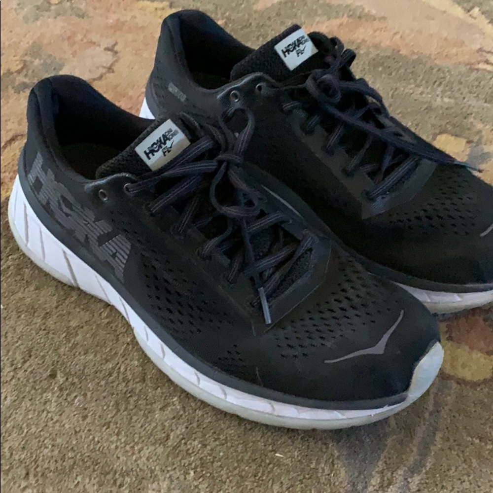 Hoka 10 black exercise shoes evacuated